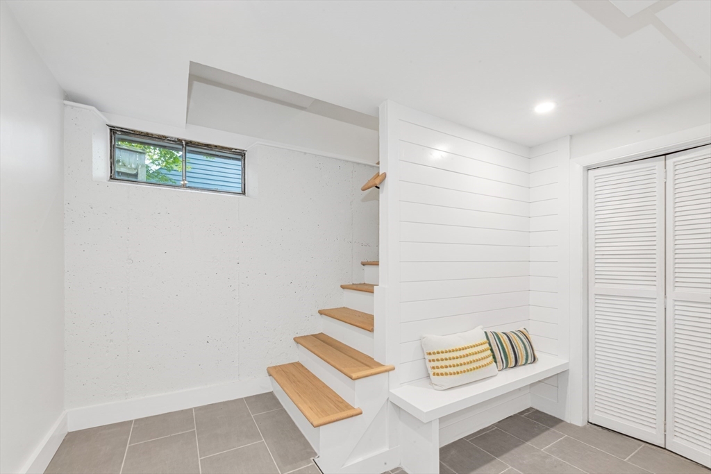 26 Crehore Road Boston, MA 02467 - Photo 33 of 33 a view of wooden floor and white walls