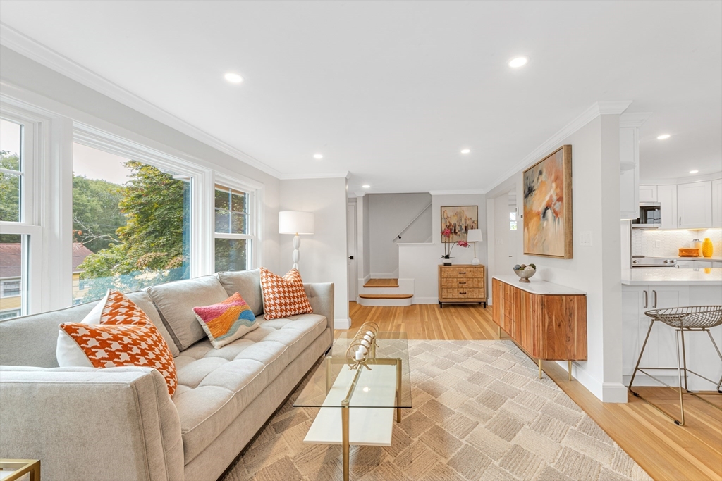 26 Crehore Road Boston, MA 02467 - Photo 5 of 33 a living room with furniture and large windows