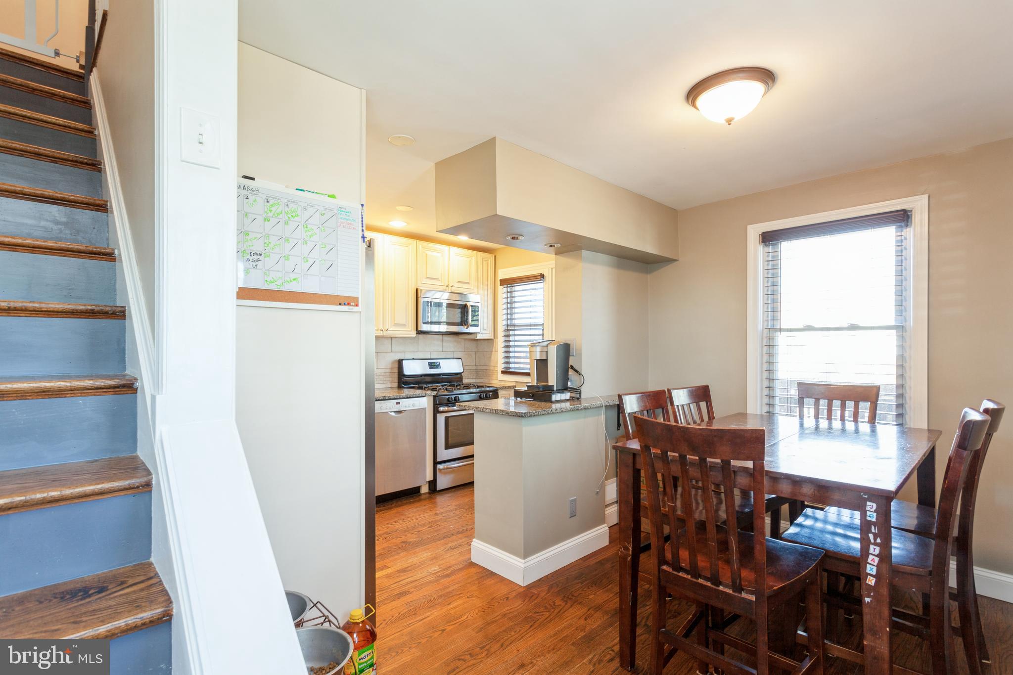 1800 Dunmere Road Baltimore, MD 21222 - Photo 14 of 40 View to kitchen and dining room from living room