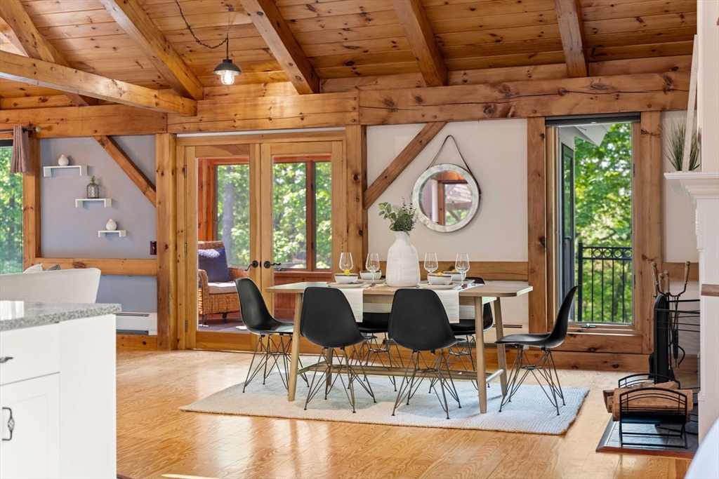 3 Whitman Place Beverly, MA 01915 - Photo 4 of 34 a view of a dining room with furniture a chandelier and wooden floor