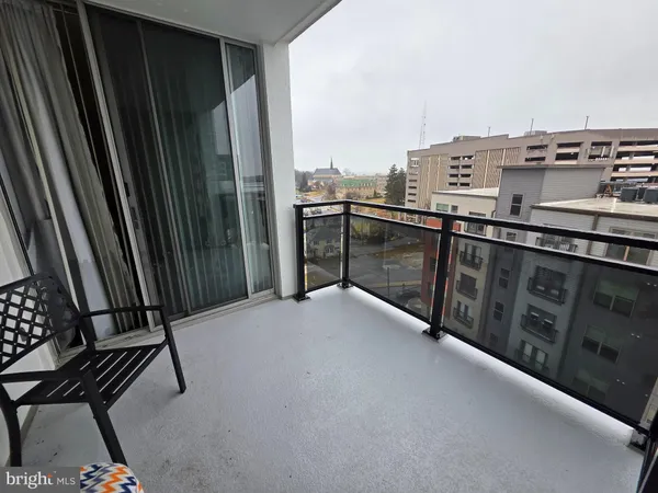 a balcony with a bench