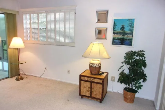 wooden floor in a gallery with front door