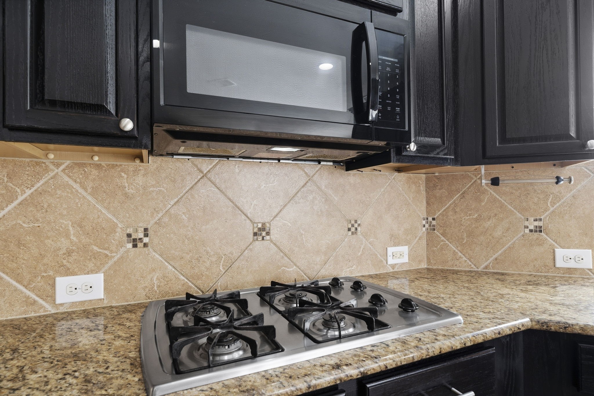8507 Clarkman Ridge Lane Cypress, TX 77433 - Photo 15 of 48 a bathroom with a granite countertop sink and a stove