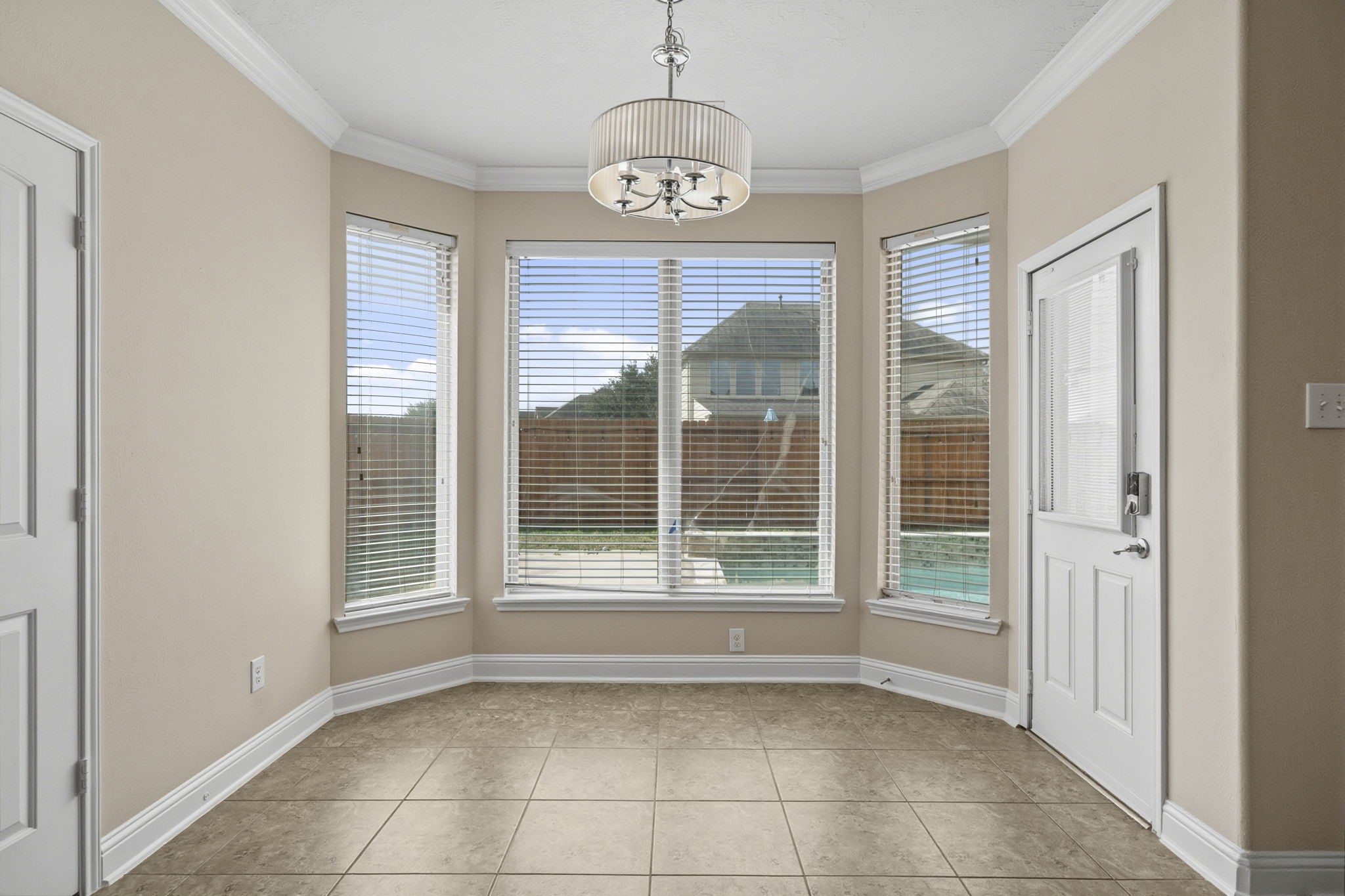 8507 Clarkman Ridge Lane Cypress, TX 77433 - Photo 16 of 48 a view of an empty room with a window