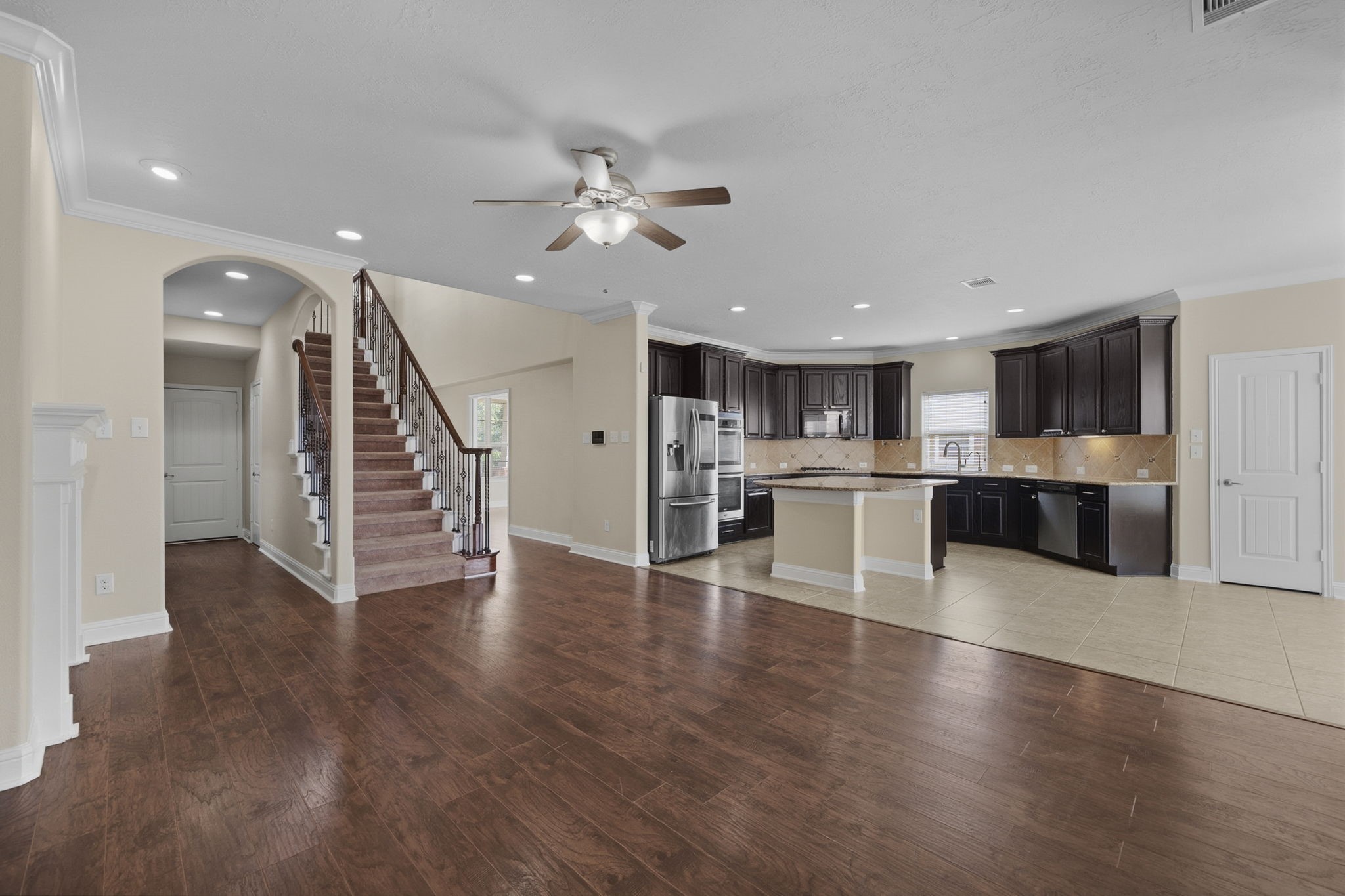 8507 Clarkman Ridge Lane Cypress, TX 77433 - Photo 20 of 48 a view of kitchen with cabinets and wooden floor