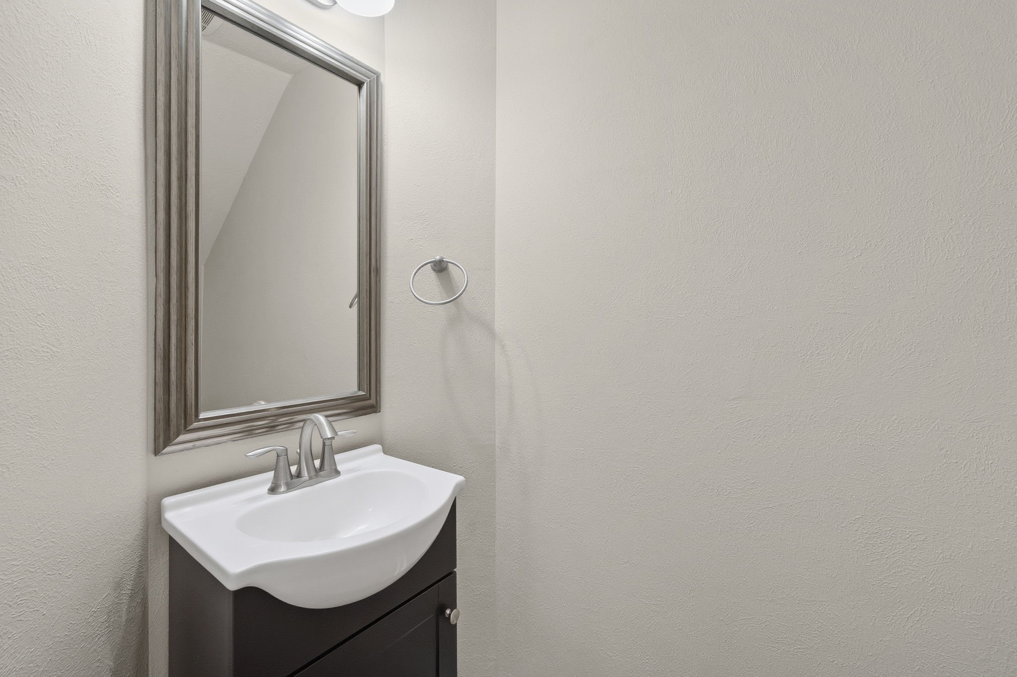 8507 Clarkman Ridge Lane Cypress, TX 77433 - Photo 22 of 48 a bathroom with a sink and a mirror