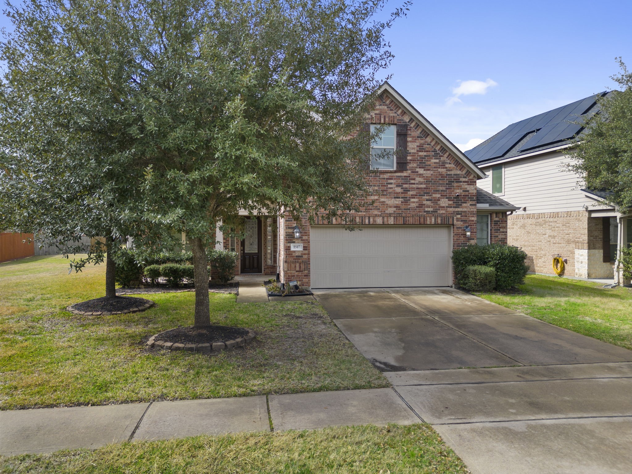 8507 Clarkman Ridge Lane Cypress, TX 77433 - Photo 3 of 48 a front view of a house with garden