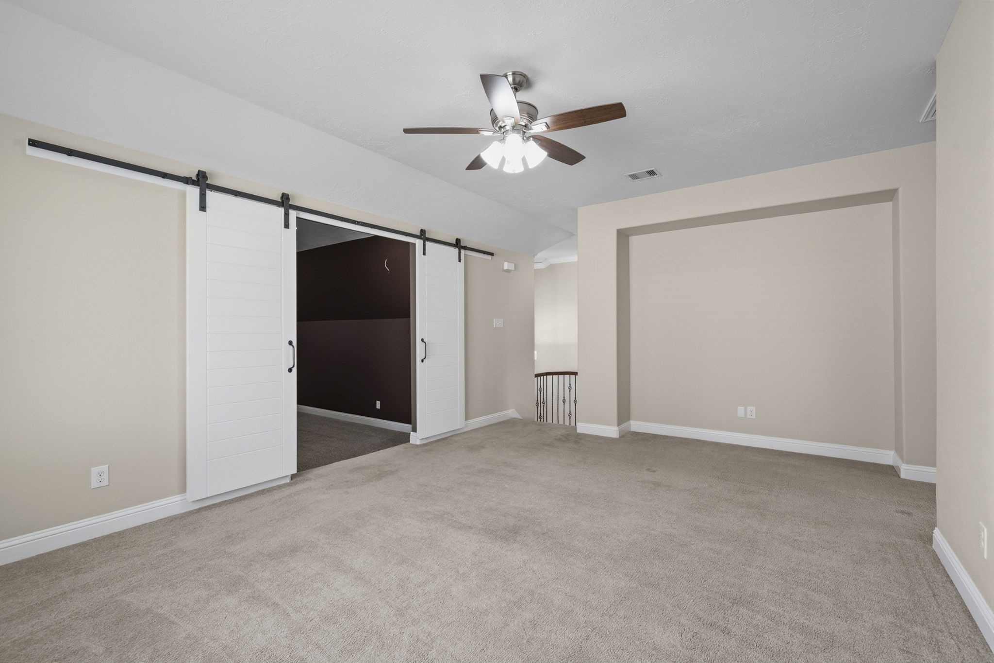 8507 Clarkman Ridge Lane Cypress, TX 77433 - Photo 32 of 48 a view of an empty room with a ceiling fan