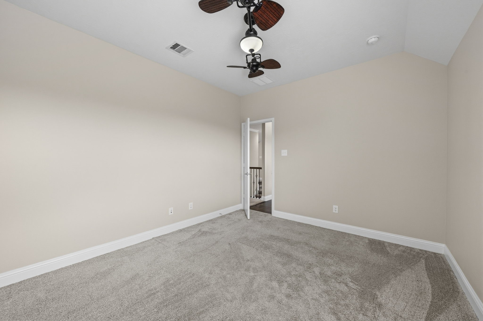 8507 Clarkman Ridge Lane Cypress, TX 77433 - Photo 39 of 48 an empty room with a chandelier fan