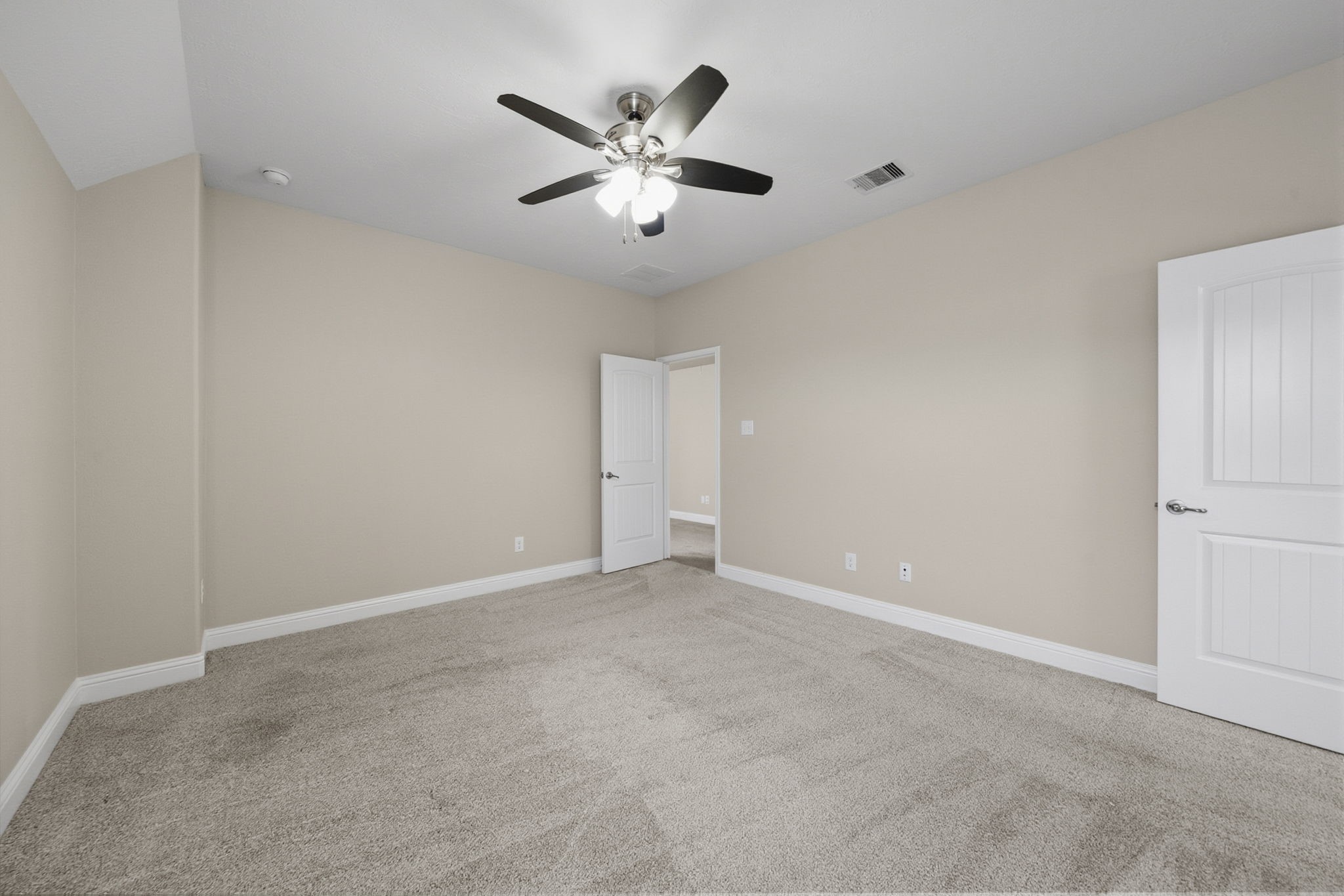 8507 Clarkman Ridge Lane Cypress, TX 77433 - Photo 43 of 48 an empty room with closet and windows