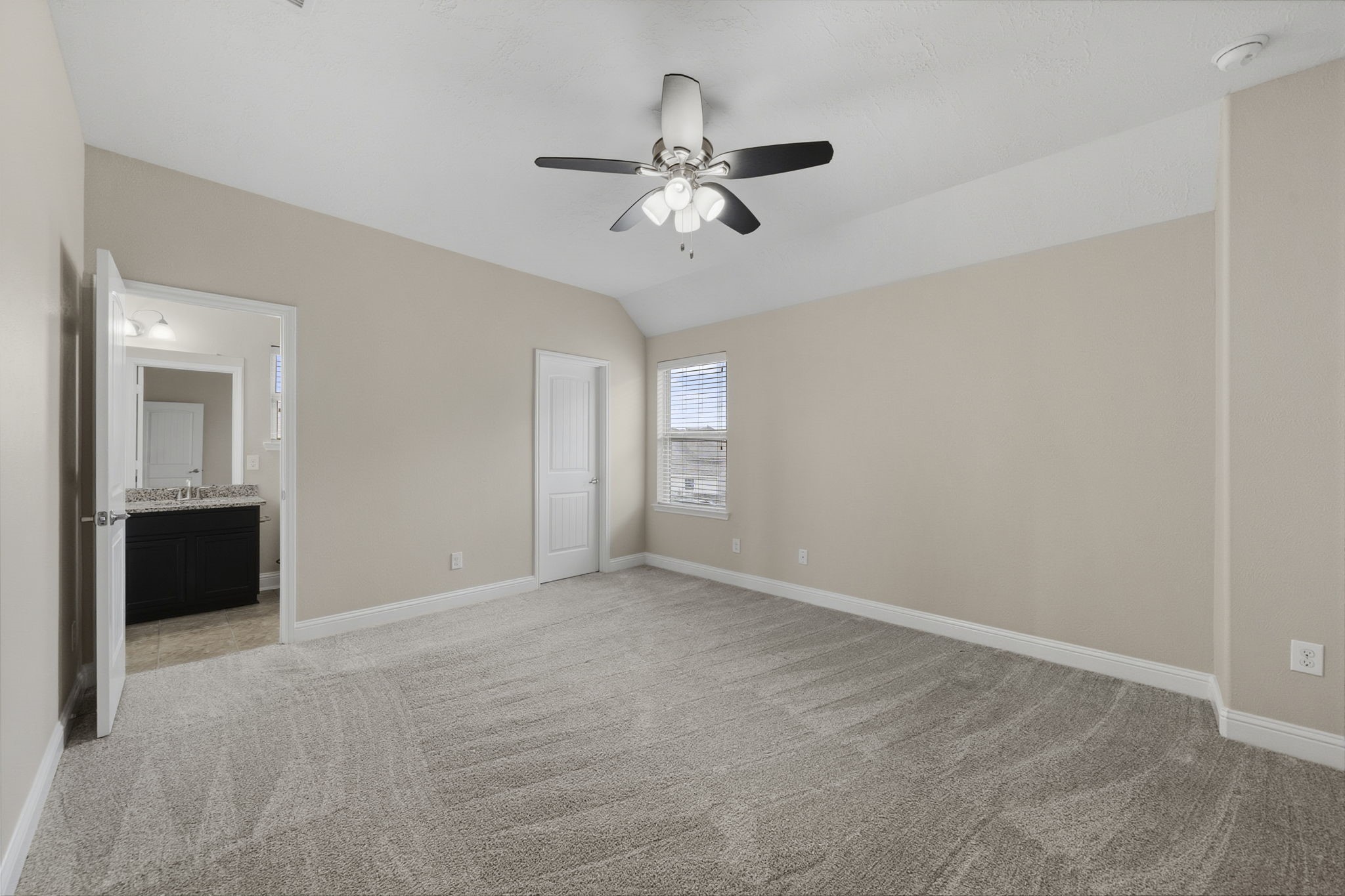 8507 Clarkman Ridge Lane Cypress, TX 77433 - Photo 44 of 48 an empty room with fan and windows