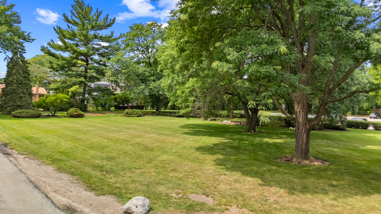 1405 East Central Road, Unit 110B Arlington Heights, IL 60005 - Photo 19 of 24 a view of a trees with a yard