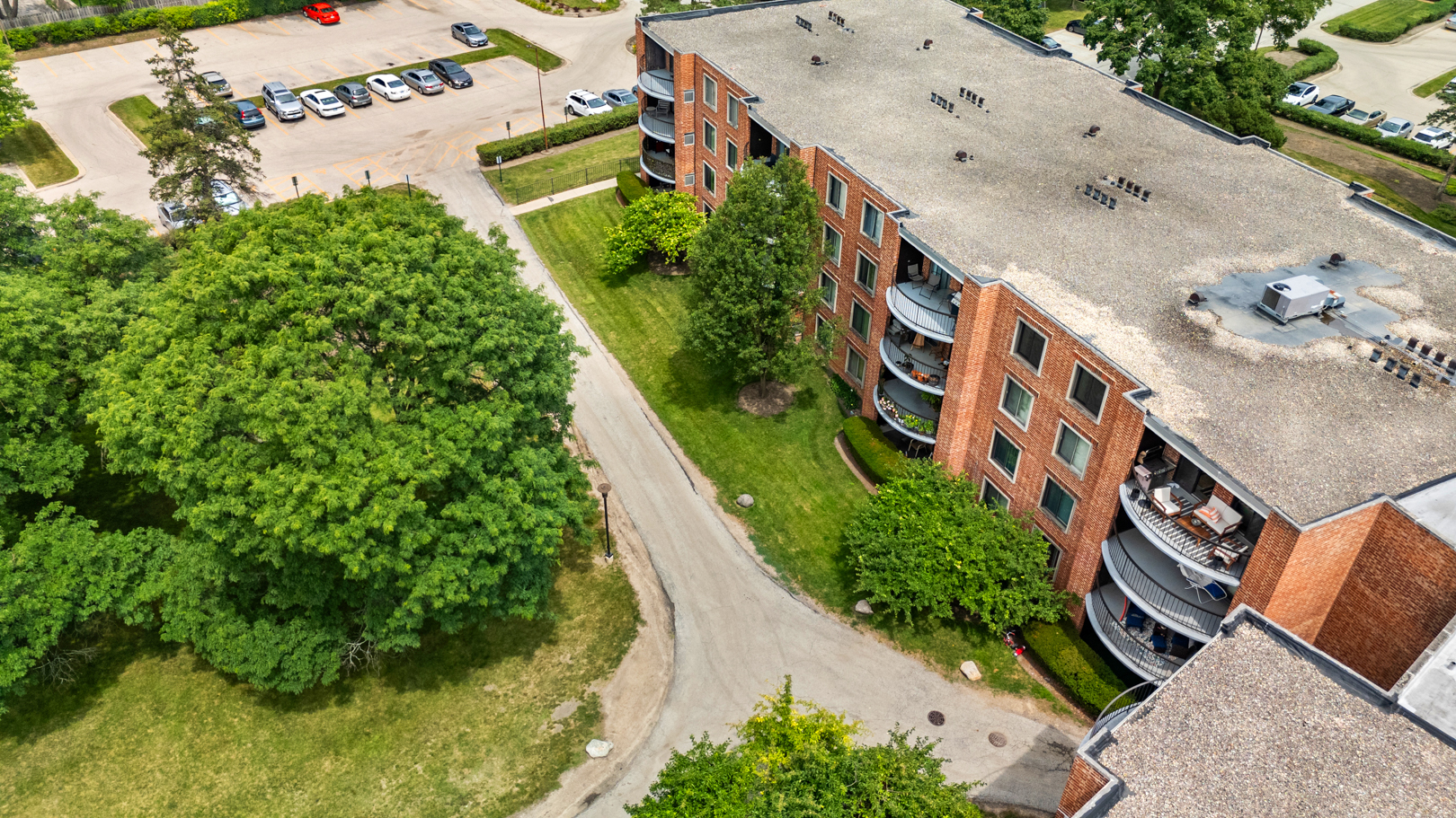 1405 East Central Road, Unit 110B Arlington Heights, IL 60005 - Photo 20 of 24 an aerial view of a house with outdoor space