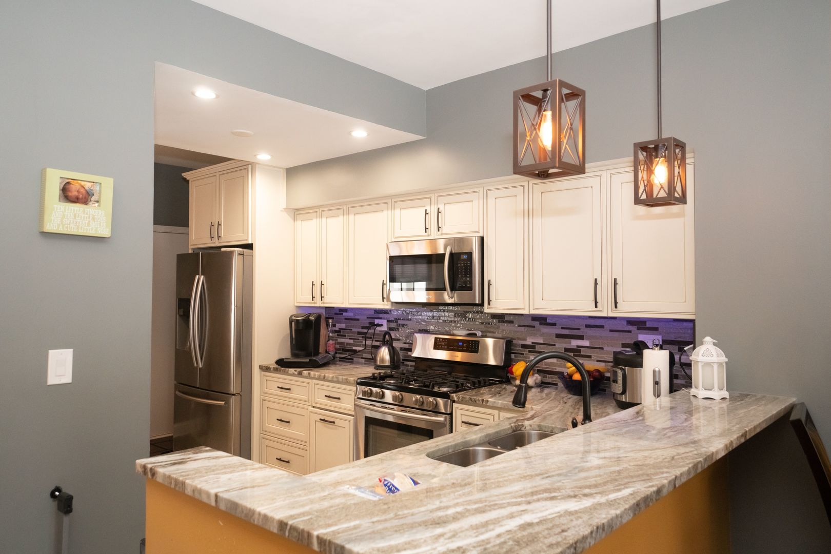 8233 Ripple Ridge, Unit 8233 Darien, IL 60561 - Photo 2 of 18 a kitchen with a refrigerator a stove and a sink