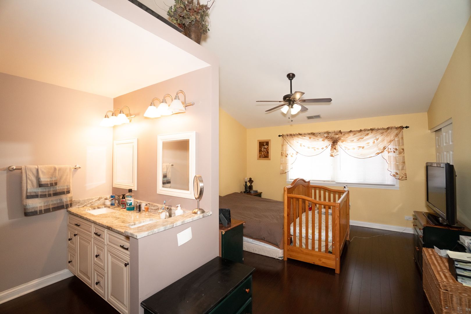 8233 Ripple Ridge, Unit 8233 Darien, IL 60561 - Photo 11 of 18 a living room with furniture and a flat screen tv
