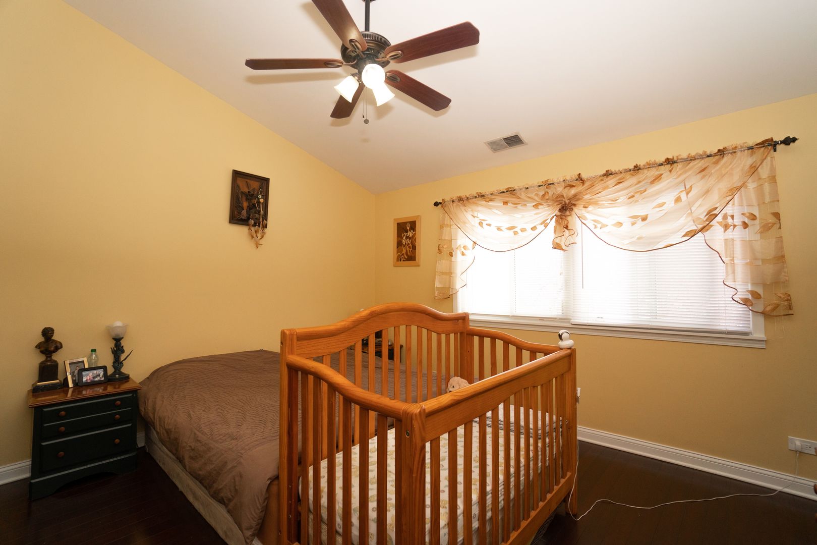 8233 Ripple Ridge, Unit 8233 Darien, IL 60561 - Photo 13 of 18 a bedroom with a bed and a window