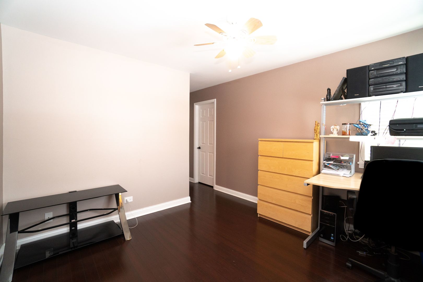 8233 Ripple Ridge, Unit 8233 Darien, IL 60561 - Photo 16 of 18 a room with furniture and a flat screen tv