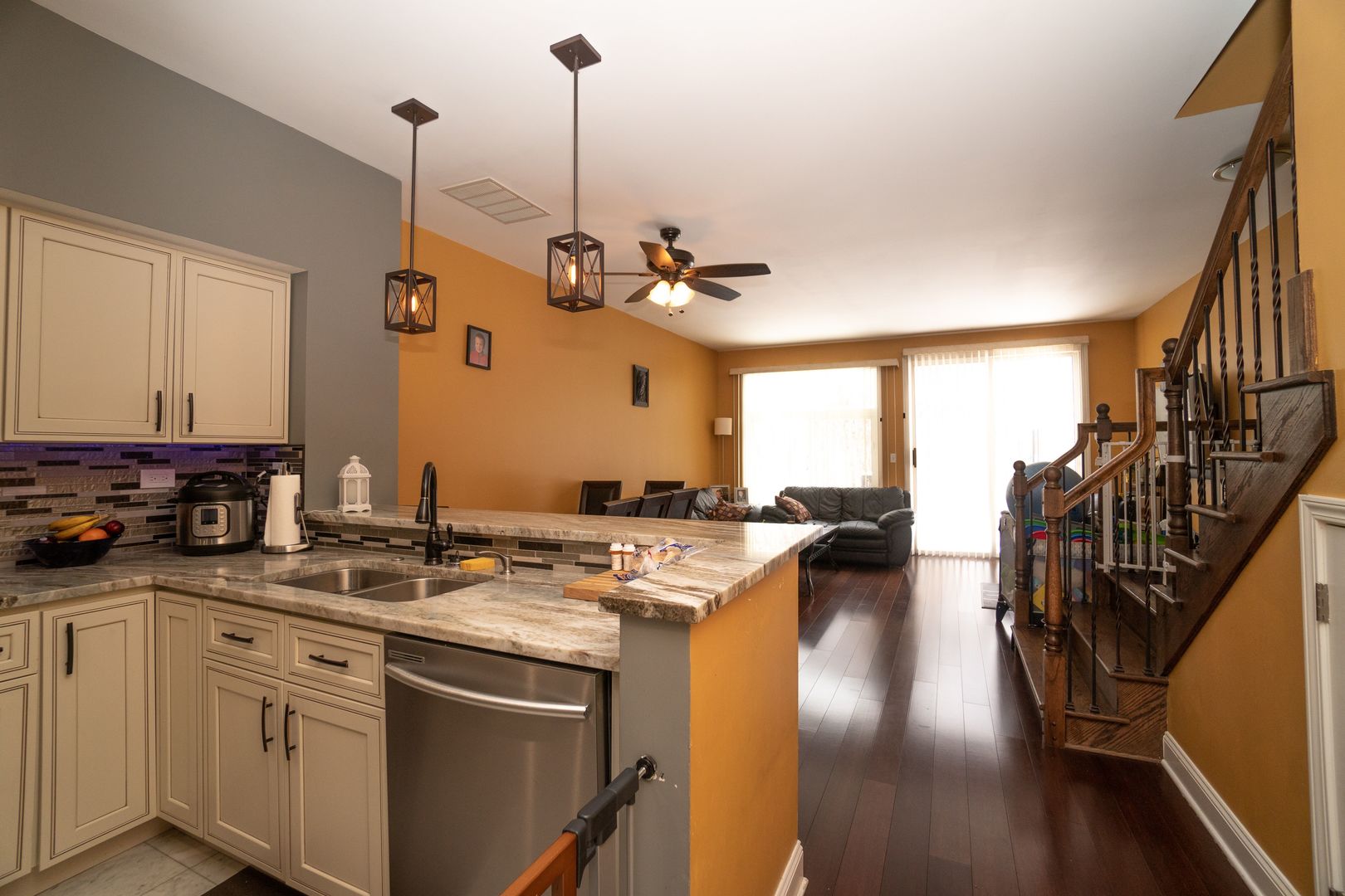 8233 Ripple Ridge, Unit 8233 Darien, IL 60561 - Photo 5 of 18 a view of a kitchen with a sink a window and appliances
