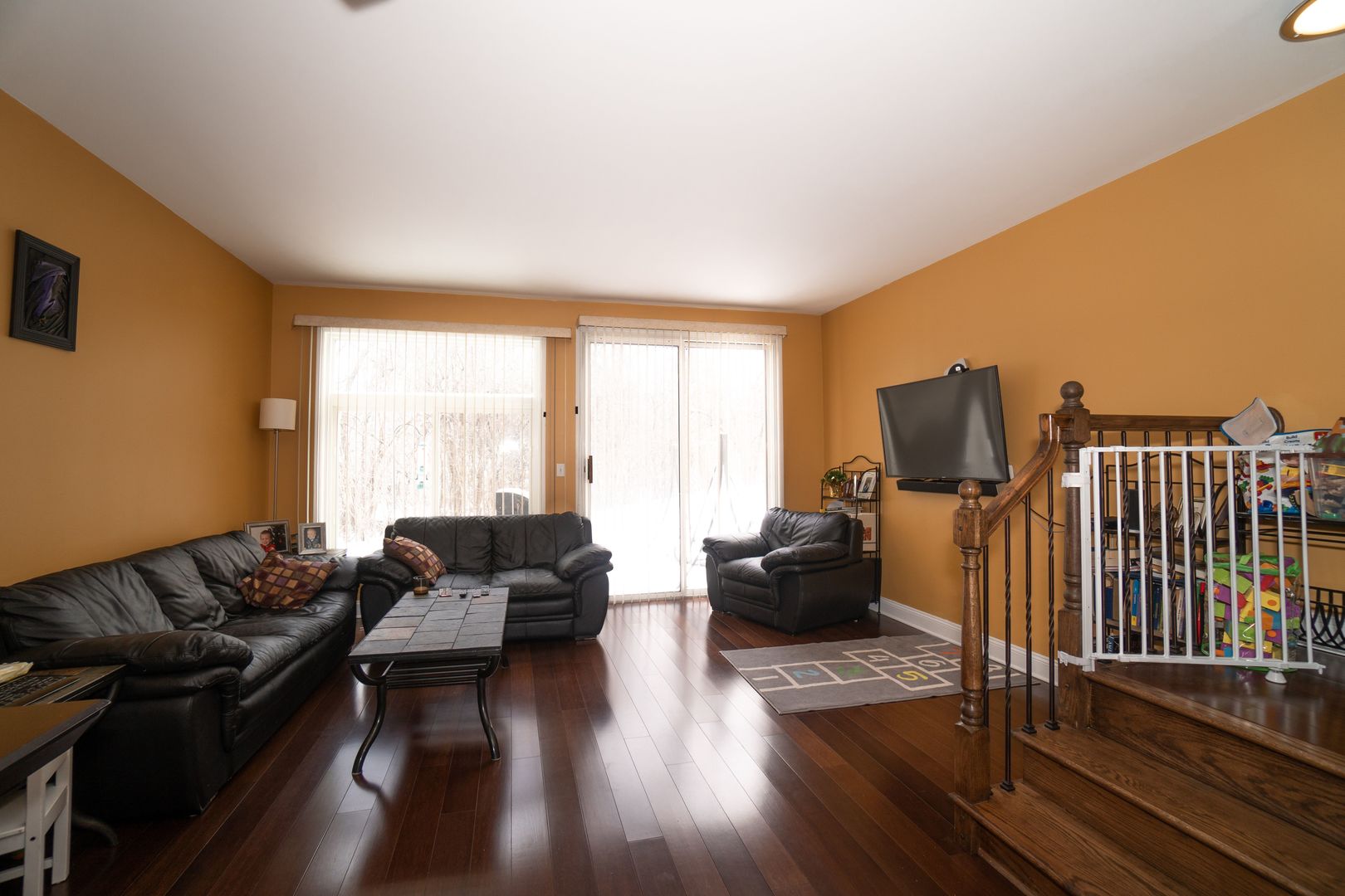 8233 Ripple Ridge, Unit 8233 Darien, IL 60561 - Photo 7 of 18 a living room with furniture and wooden floor