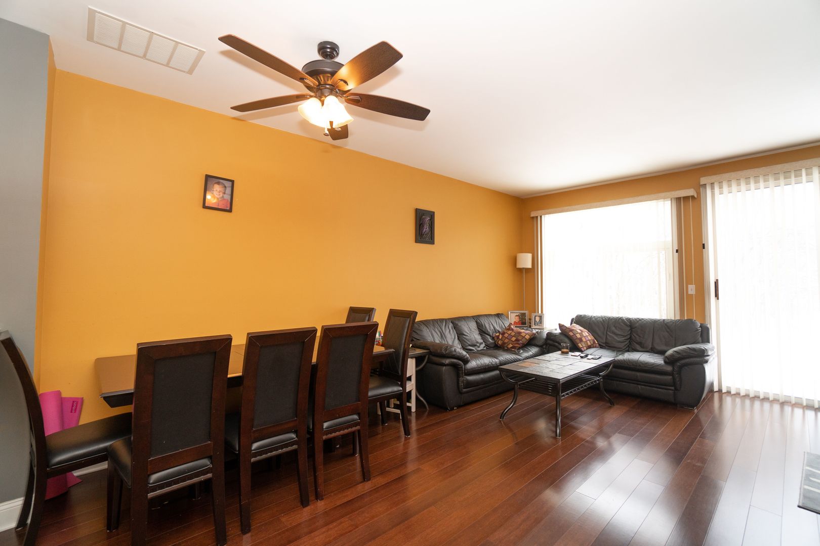 8233 Ripple Ridge, Unit 8233 Darien, IL 60561 - Photo 9 of 18 a living room with furniture and wooden floor