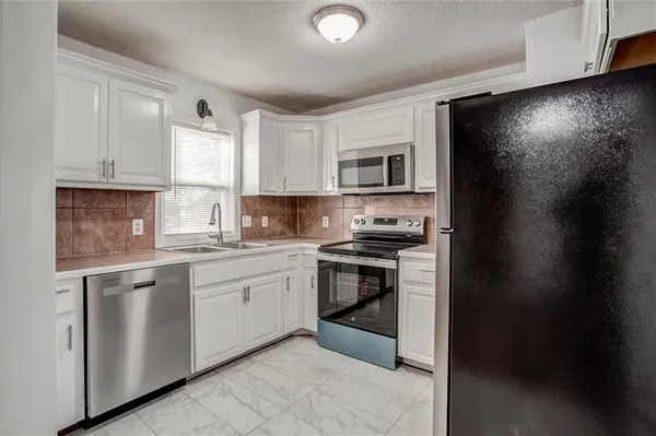 $209,900 | 4928 North Topping Avenue, Kansas City, MO 64119