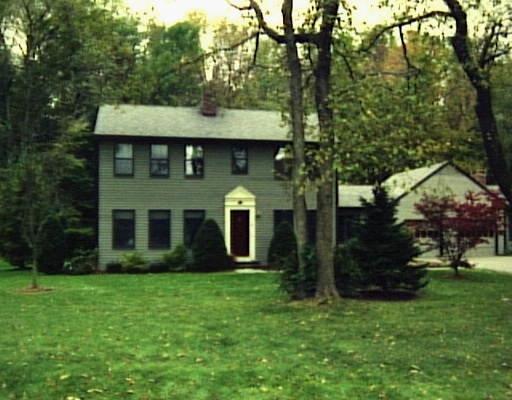 433 Kent Cornwall Road, Unit 11A Kent, CT 06757 - Photo 1 of 1 a view of a house with a yard