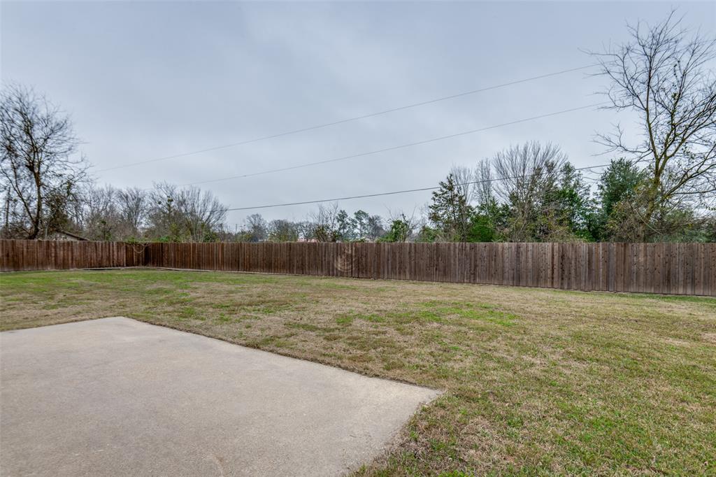 1055 Wright Street Terrell, TX 75160 - Photo 18 of 20 a view of outdoor space with river and trees