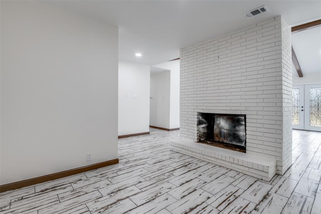 1055 Wright Street Terrell, TX 75160 - Photo 5 of 20 a living room with a fireplace
