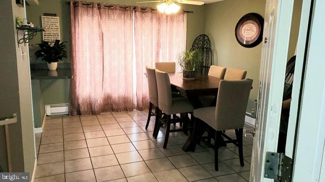 38 Great Oak Road Levittown, PA 19057 - Photo 12 of 28 Ceramic tile floor in dining room
