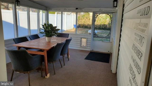 38 Great Oak Road Levittown, PA 19057 - Photo 15 of 28 Screened in patio exiting to fenced in yard