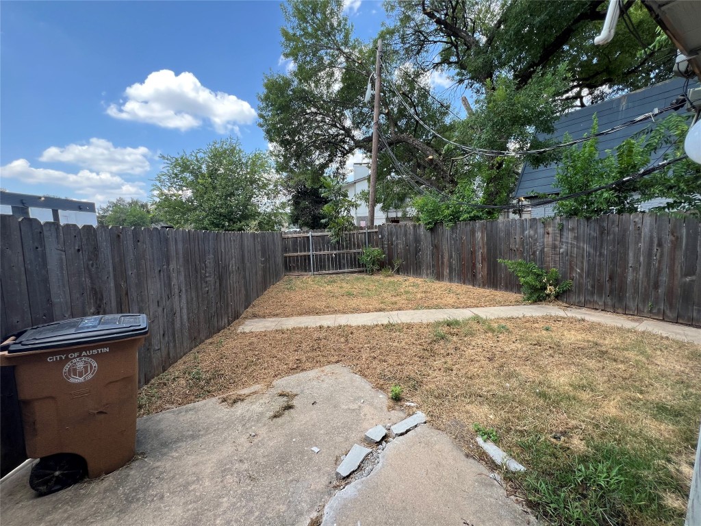 5808 Wellington Drive, Unit 4 Austin, TX 78723 - Photo 12 of 12 a swimming pool with wooden fence