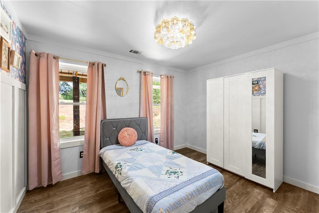 455 Cliff Nelson Road Taylorsville, GA 30178 - Photo 26 of 42 a bedroom with a bed and a window