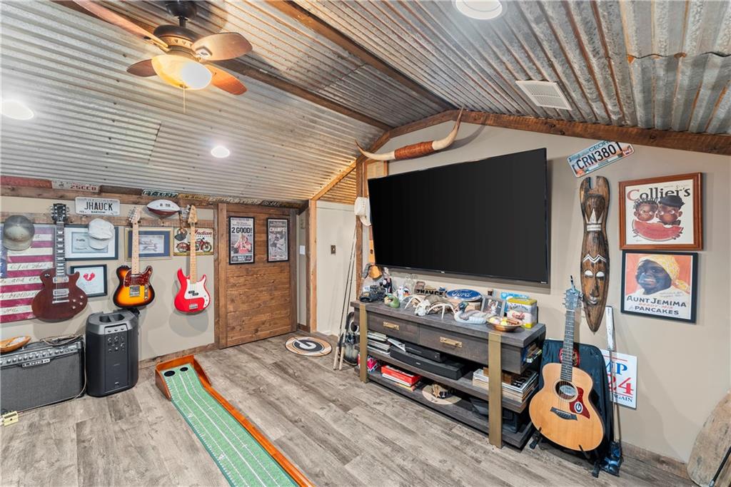 455 Cliff Nelson Road Taylorsville, GA 30178 - Photo 29 of 42 a room with toys and flat screen tv