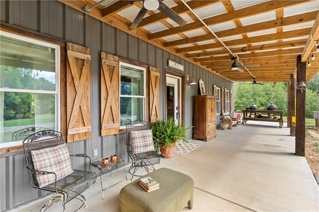 455 Cliff Nelson Road Taylorsville, GA 30178 - Photo 30 of 42 a building outdoor space with patio furniture and potted plants