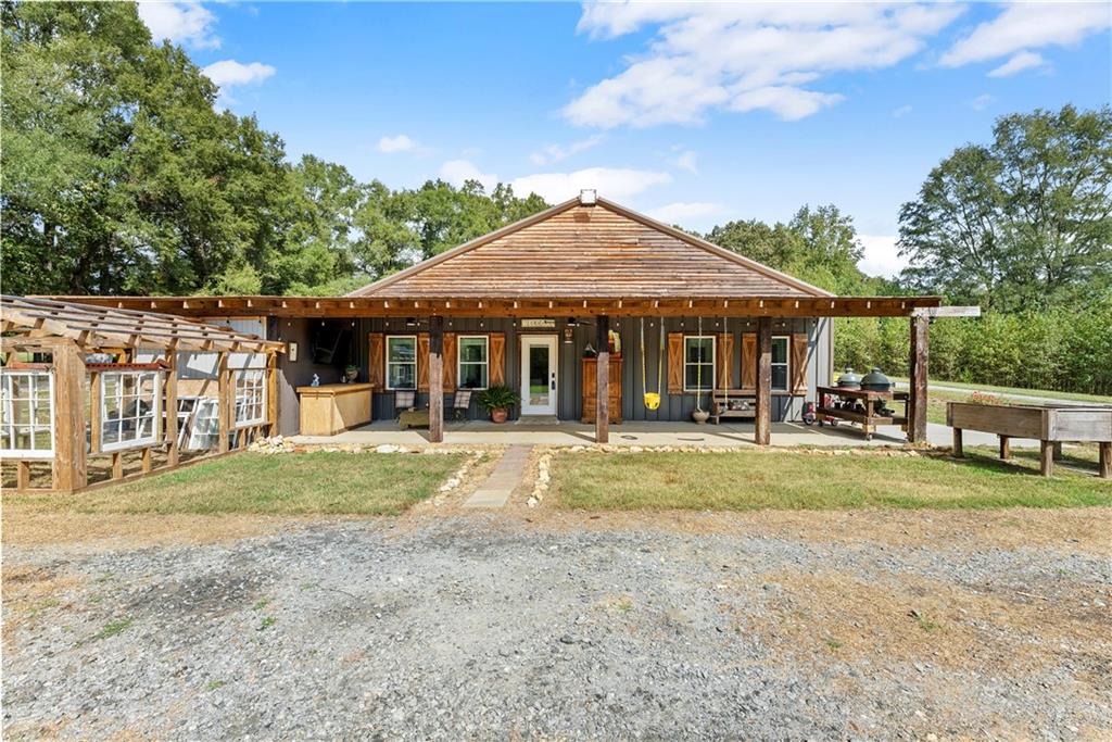 455 Cliff Nelson Road Taylorsville, GA 30178 - Photo 32 of 42 a front view of a house with a yard