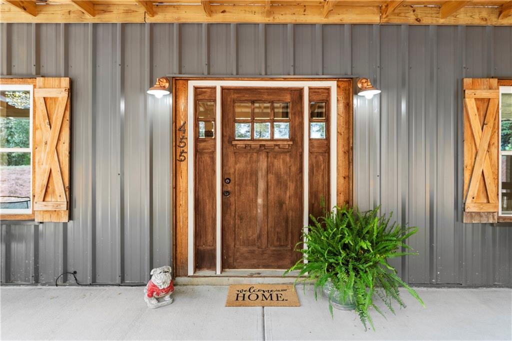 455 Cliff Nelson Road Taylorsville, GA 30178 - Photo 4 of 42 a view of outdoor space with sliding door and wooden fence