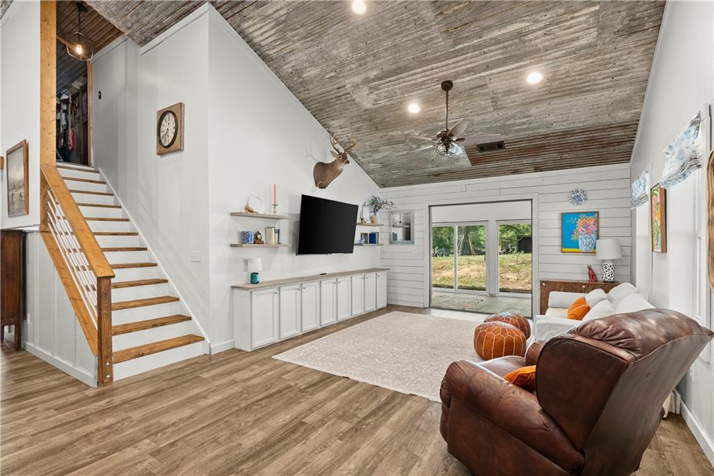 455 Cliff Nelson Road Taylorsville, GA 30178 - Photo 6 of 42 a living room with furniture and a flat screen tv