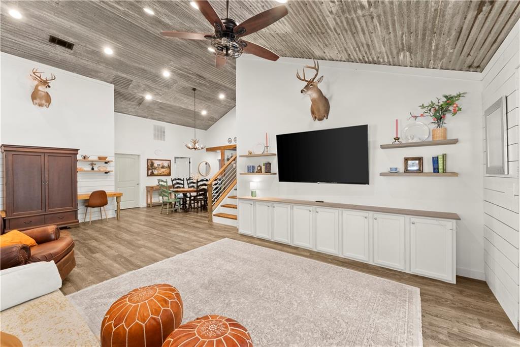 455 Cliff Nelson Road Taylorsville, GA 30178 - Photo 8 of 42 a living room with furniture and a flat screen tv