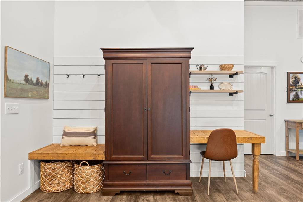 455 Cliff Nelson Road Taylorsville, GA 30178 - Photo 9 of 42 a living room with a chair and potted plant
