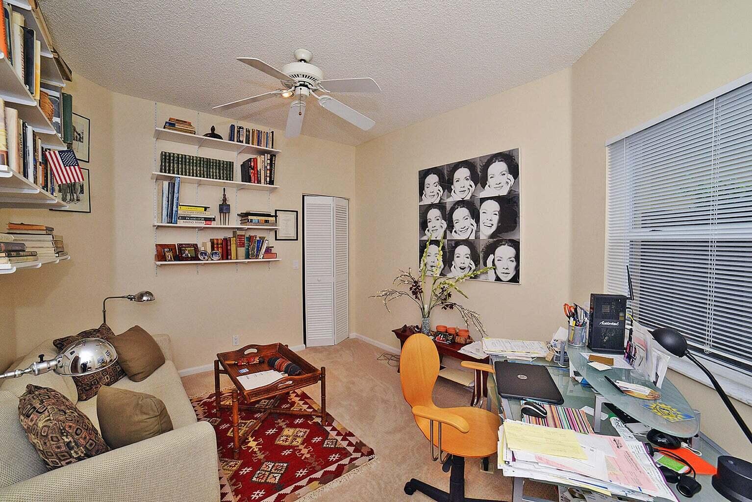 6695 Northwest 25th Court Boca Raton, FL 33496 - Photo 11 of 40 a living room with furniture and a window