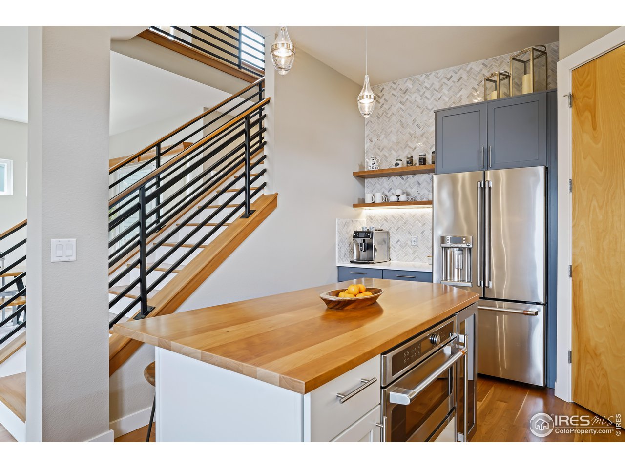 5263 Denver Street Boulder, CO 80304 - Photo 14 of 40 a kitchen that has a sink and a refrigerator
