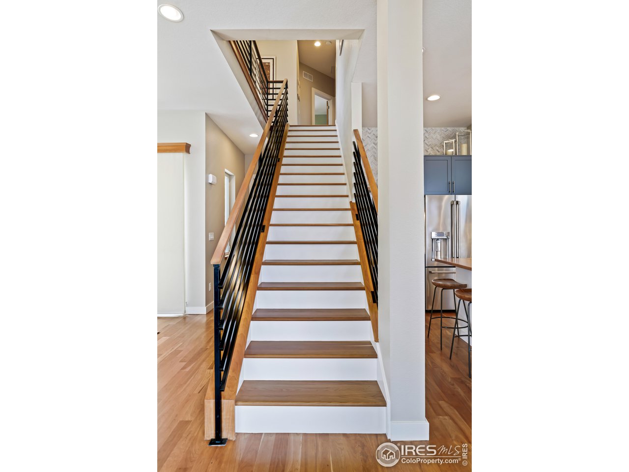 5263 Denver Street Boulder, CO 80304 - Photo 16 of 40 a view of entryway and hall with wooden floor