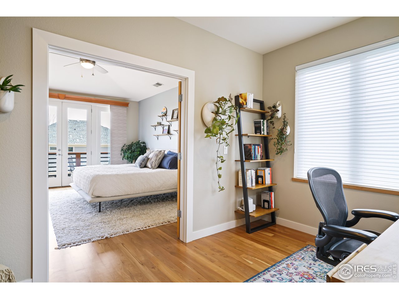 5263 Denver Street Boulder, CO 80304 - Photo 17 of 40 a living room with furniture rug and window