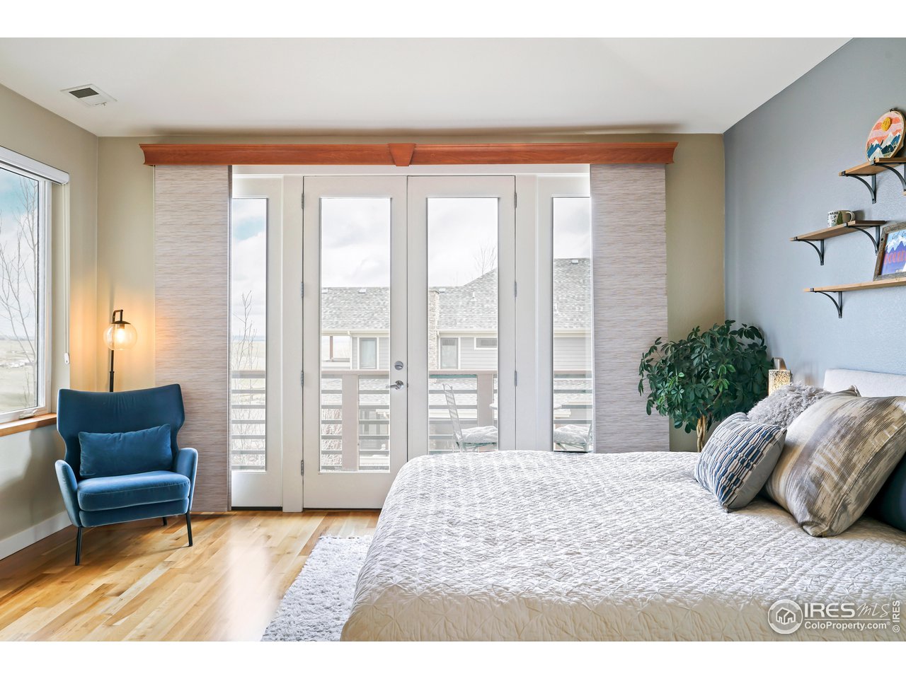 5263 Denver Street Boulder, CO 80304 - Photo 18 of 40 a bedroom with a large bed and a couch