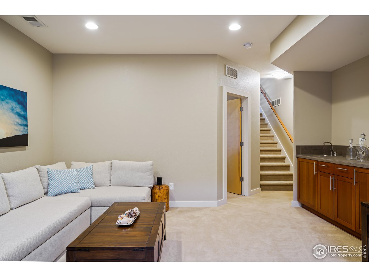 5263 Denver Street Boulder, CO 80304 - Photo 27 of 40 a living room with furniture and stairs
