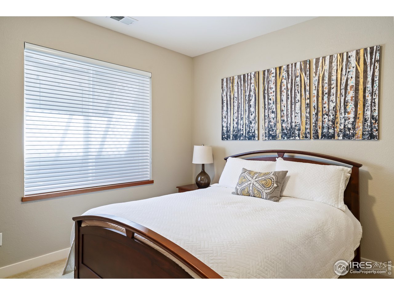 5263 Denver Street Boulder, CO 80304 - Photo 28 of 40 a bedroom with a bed and a window