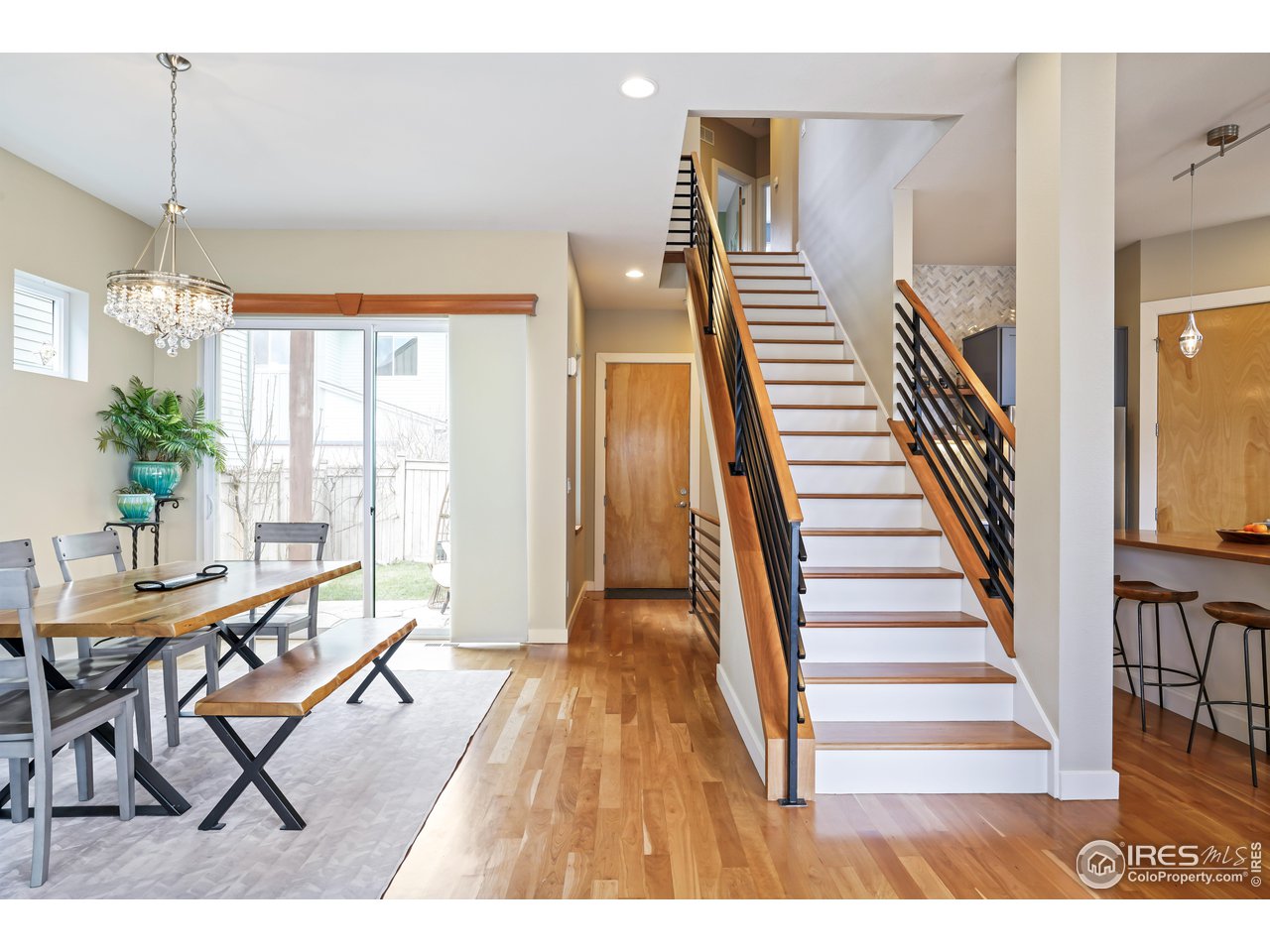 5263 Denver Street Boulder, CO 80304 - Photo 4 of 40 a view of a livingroom with furniture wooden floor and windows