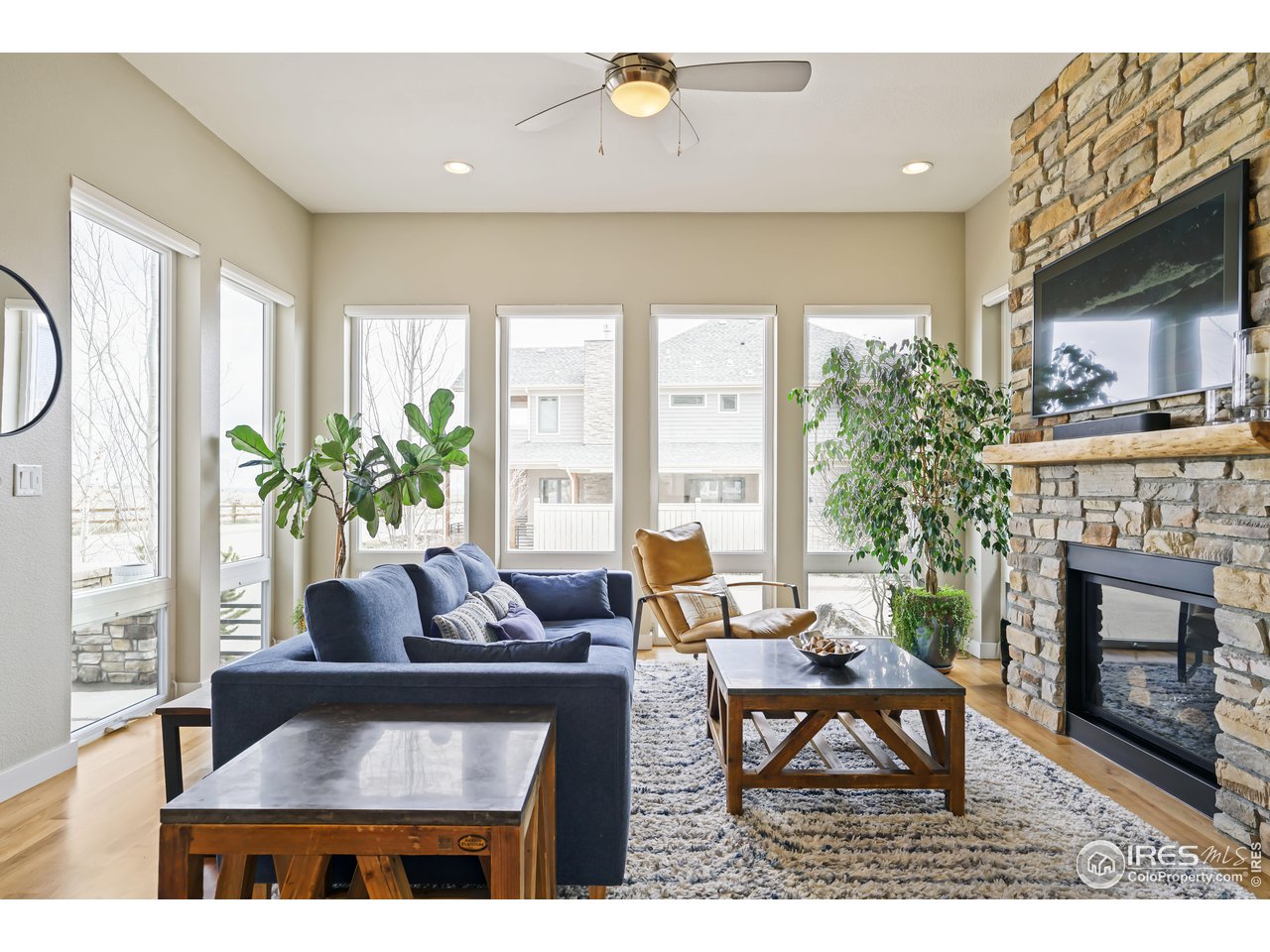 5263 Denver Street Boulder, CO 80304 - Photo 6 of 40 a living room with furniture and a fireplace