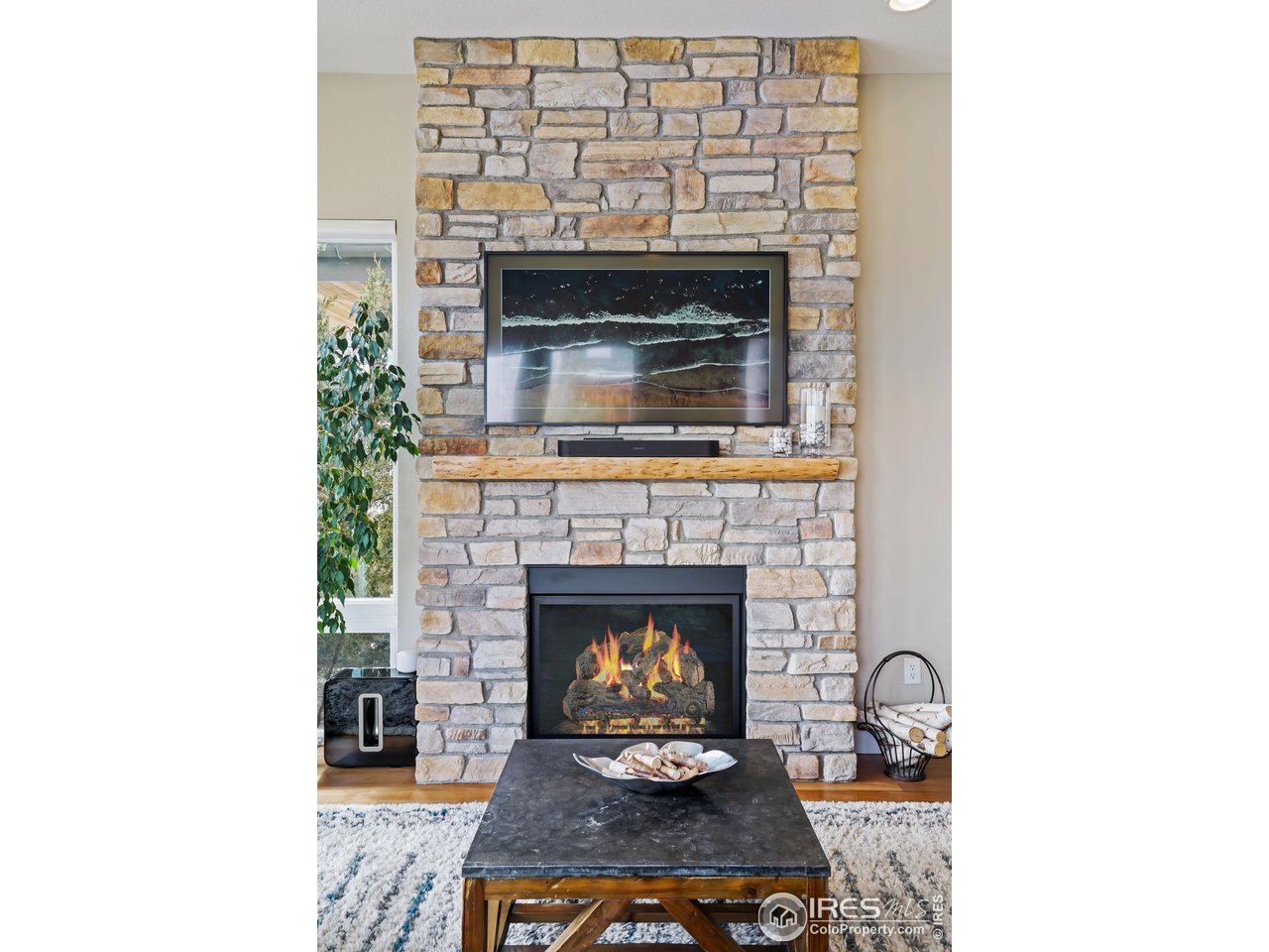 5263 Denver Street Boulder, CO 80304 - Photo 7 of 40 a living room with furniture and a fireplace