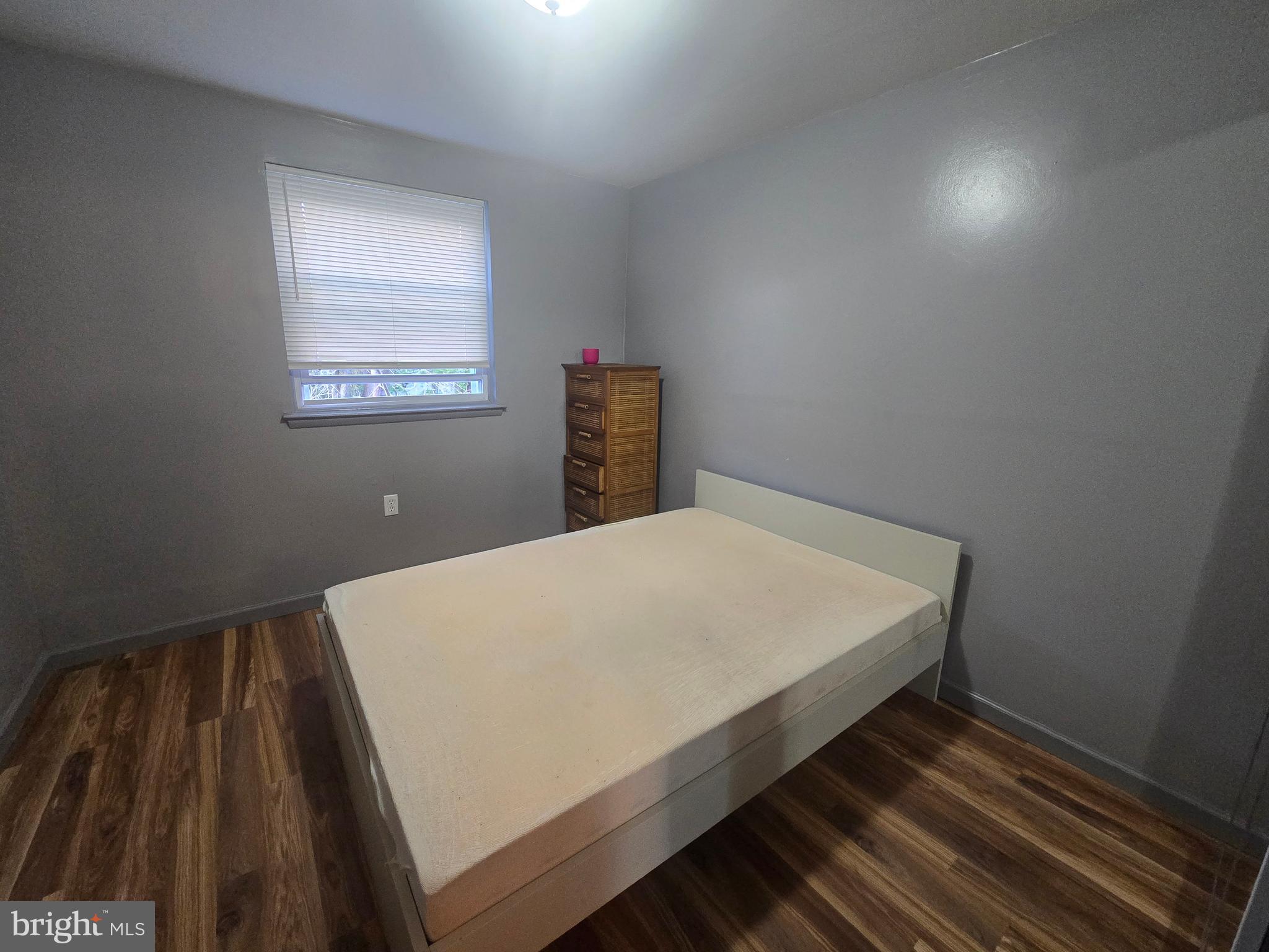 529 Foster Street Philadelphia, PA 19116 - Photo 14 of 17 a bed sitting in a bedroom next to a window